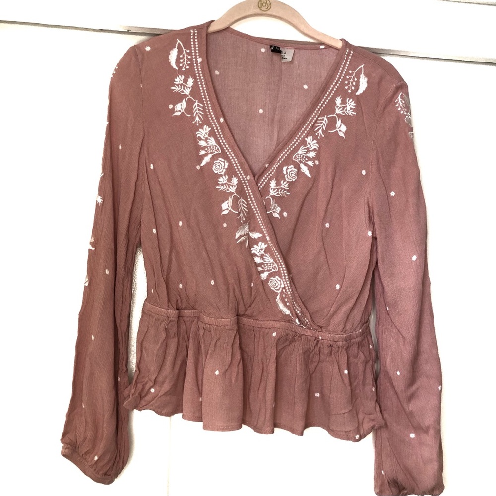 H&M divided: flowy pink blouse with flower pattern